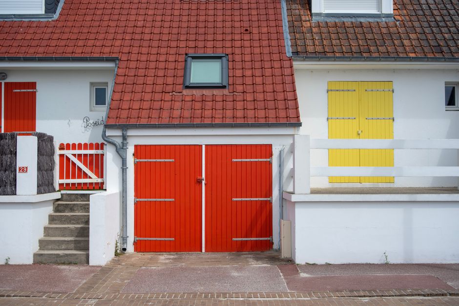 A painted exterior wall and trim on a home